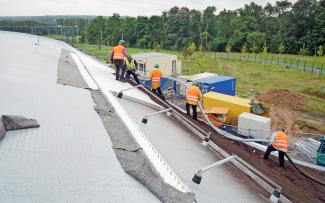 System substrate “Rockery Type Plants” is blown onto the roof. Substrate is blown up onto the roof